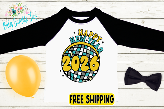 A white t-shirt with a graphic design of a disco ball and the text "Happy New Year 2026" printed on it, along with a black bow tie and a yellow balloon.